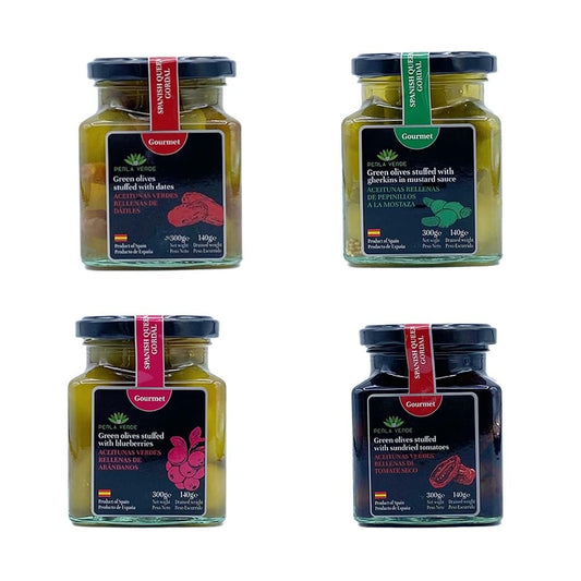 Gourmet-Set mit gefüllten Sevilla-Oliven: Gurken, Datteln, Blaubeeren und Tomaten